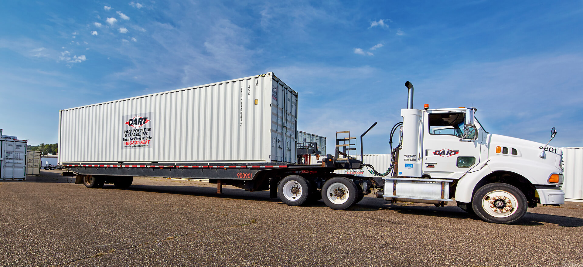Dart Portable Storage container loaded on flatbed truck ready for delivery